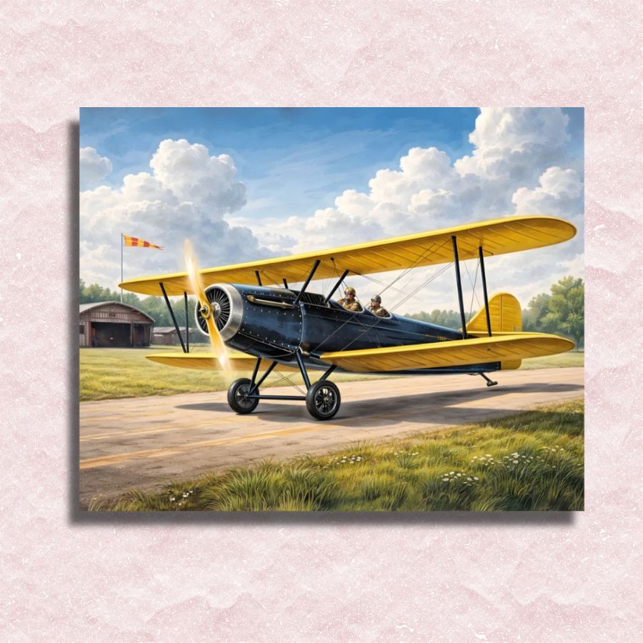 Vintage yellow biplane on a runway with a clear sky and clouds in the background. Vintage Airplane - Paint by numberes